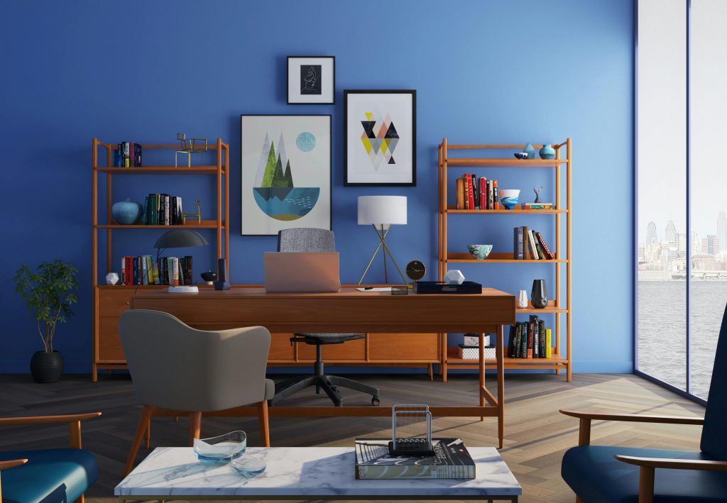 pexels photo 667838 667838 Elegantly decorated home office with modern furniture and a blue wall.